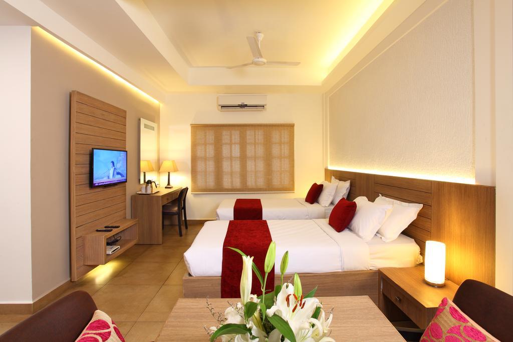 Hotel Luciya Palace Thrissur Phòng bức ảnh
